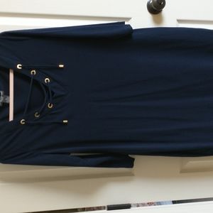 Chelsea and Theodore navy blue dress with gold accents